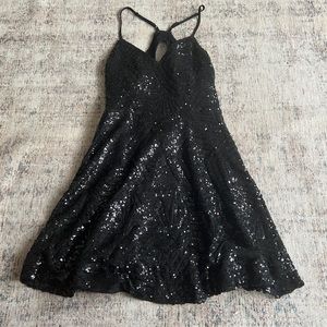 black glittery mini dress